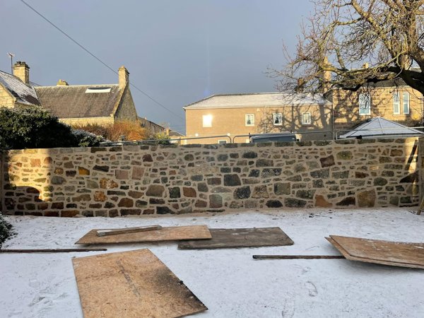 Boundary sandstone wall