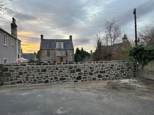 Boundary sandstone wall - After