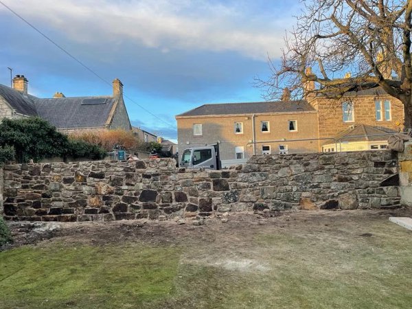 Boundary sandstone wall - After